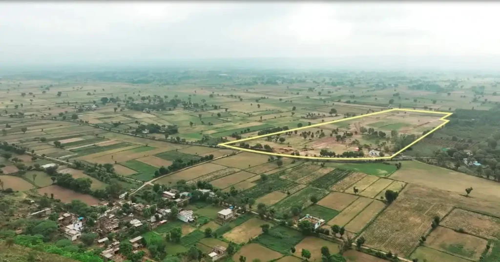 Naugaon Alwar farmland with modern farmhouses and greenery